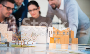 stock-photo-61631122-young-architects-working-together